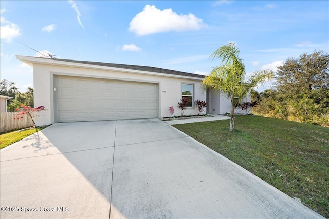 single story home with a garage and a front yard