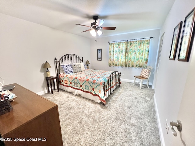 bedroom with ceiling fan and carpet flooring