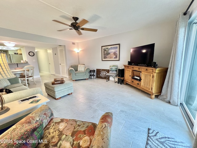 living room with ceiling fan