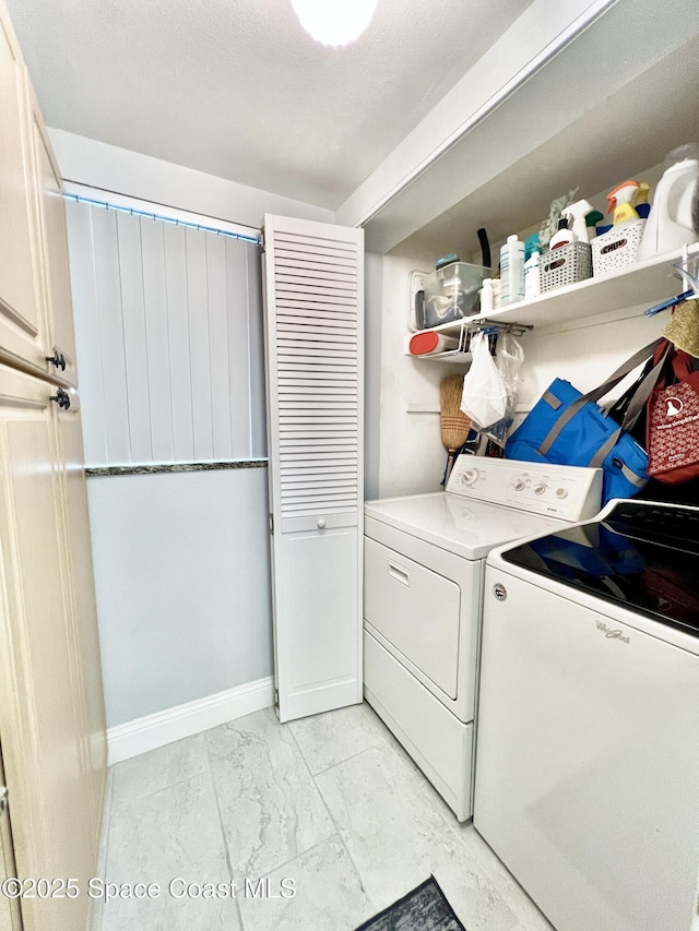 laundry room featuring washer and dryer