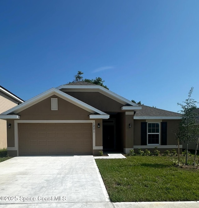 1201 Tupelo Cir, Cocoa, FL 32926 - single story home featuring stucco siding, concrete driveway, a front lawn, and an attached garage