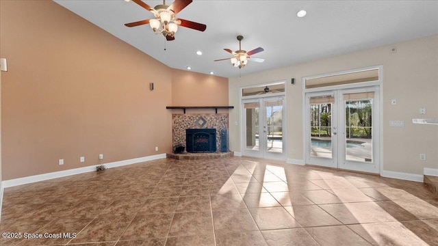 unfurnished living room featuring tile patterned flooring, french doors, baseboards, and recessed lighting