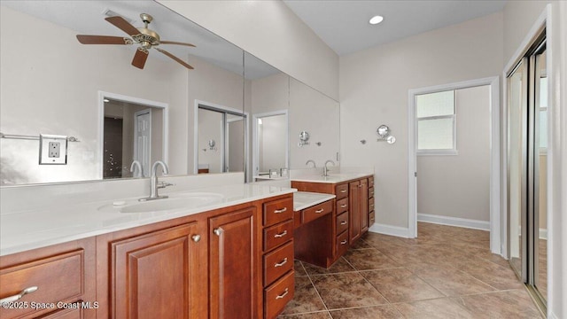 bathroom with recessed lighting, ceiling fan, vanity, baseboards, and tile patterned floors