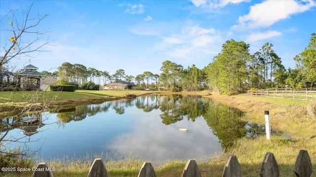 view of water feature featuring fence