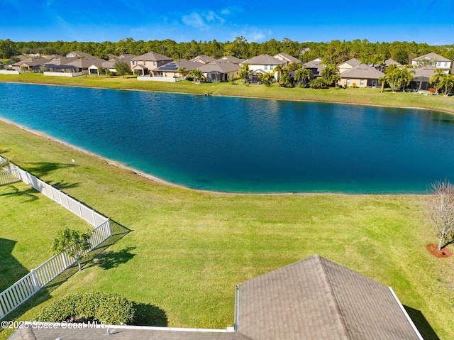 drone / aerial view with a water view