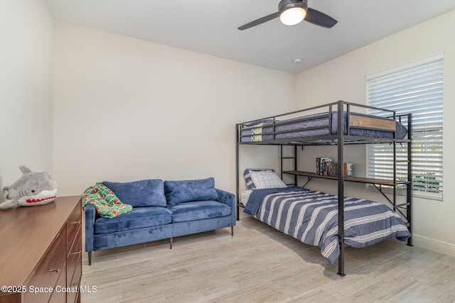 bedroom featuring ceiling fan and light wood-type flooring