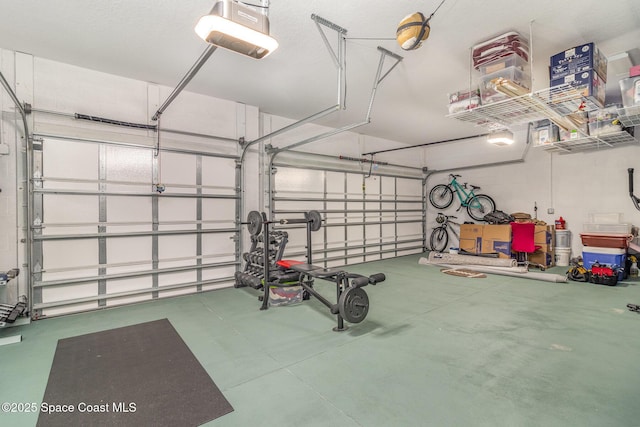 garage featuring a garage door opener