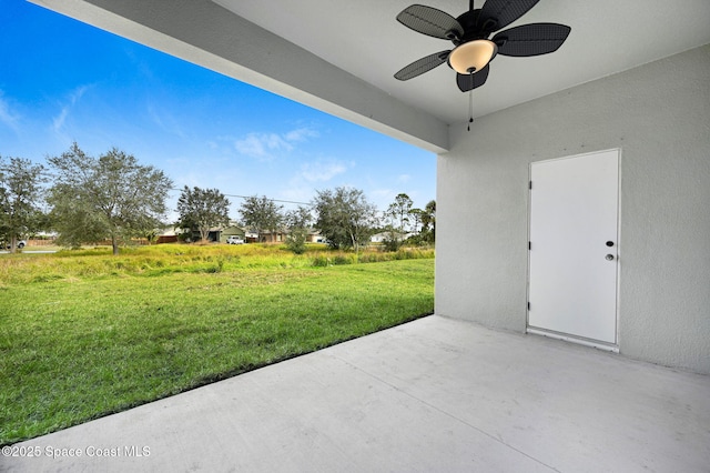 view of patio with ceiling fan