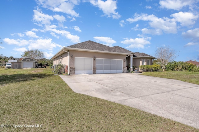 view of front of home featuring a garage and a front yard