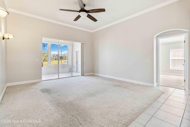 spare room with ornamental molding, light colored carpet, and ceiling fan