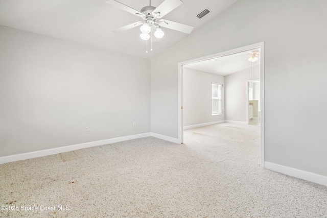 unfurnished room with vaulted ceiling and ceiling fan