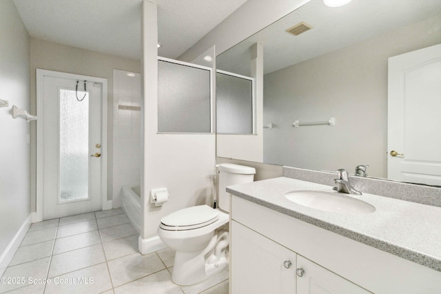 bathroom featuring tile patterned floors, toilet, and vanity