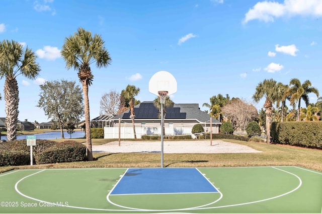 view of basketball court with a yard and volleyball court