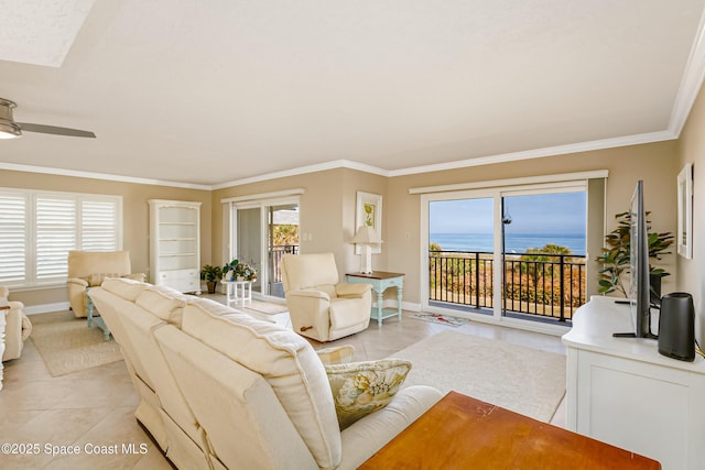 living room with light tile patterned floors, crown molding, and ceiling fan