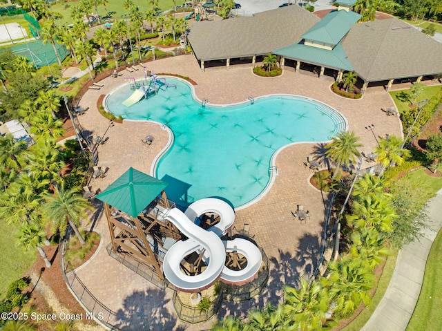 exterior space with a water slide and a patio