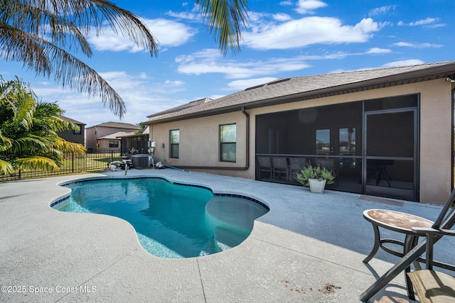 view of swimming pool featuring central AC and a patio