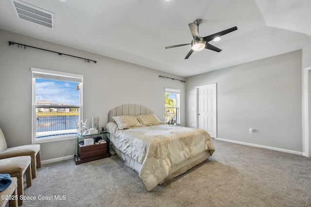 bedroom with light carpet and ceiling fan