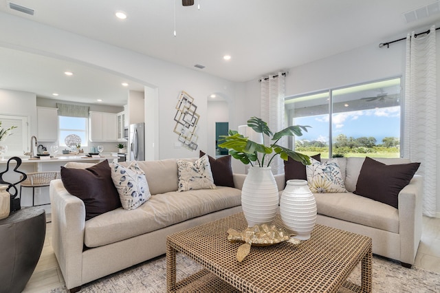 living room featuring ceiling fan