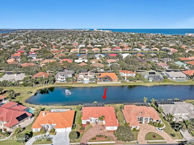 drone / aerial view featuring a water view