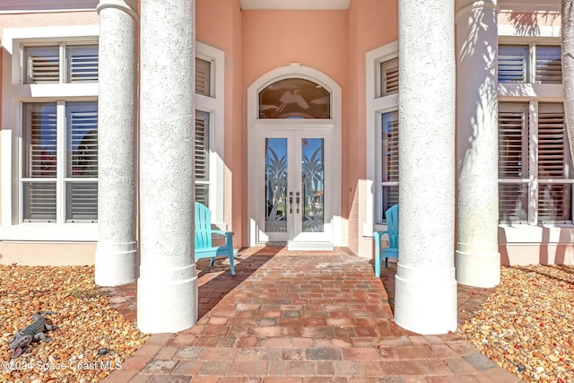 entrance to property featuring french doors