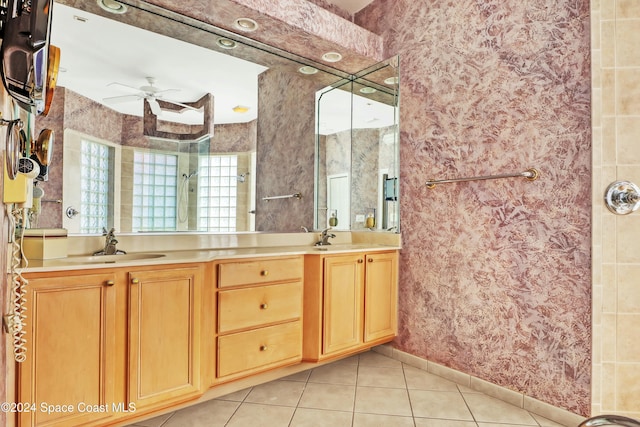 bathroom featuring tile patterned flooring, vanity, and ceiling fan