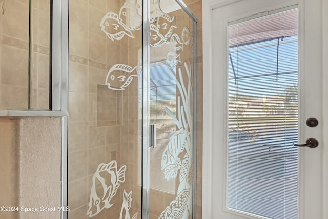 bathroom featuring an enclosed shower