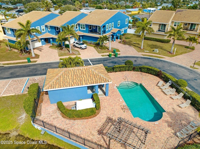 view of swimming pool with a patio