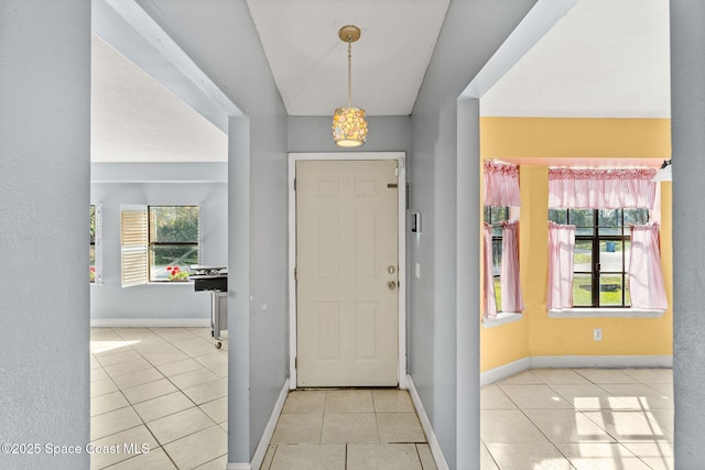 foyer with light tile patterned floors