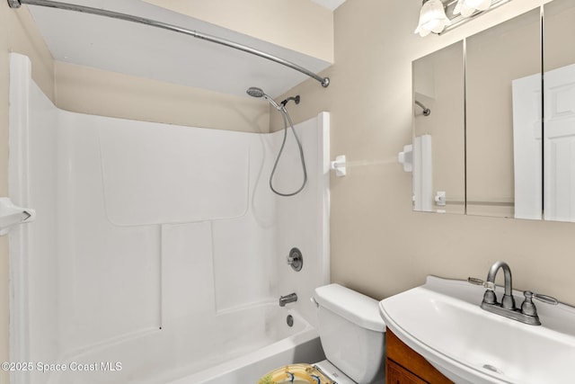 full bathroom with vanity, shower / bathtub combination, and toilet