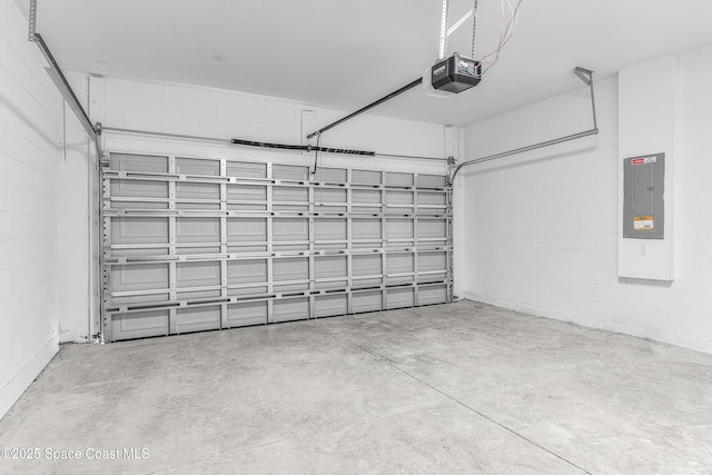 garage featuring a garage door opener and electric panel