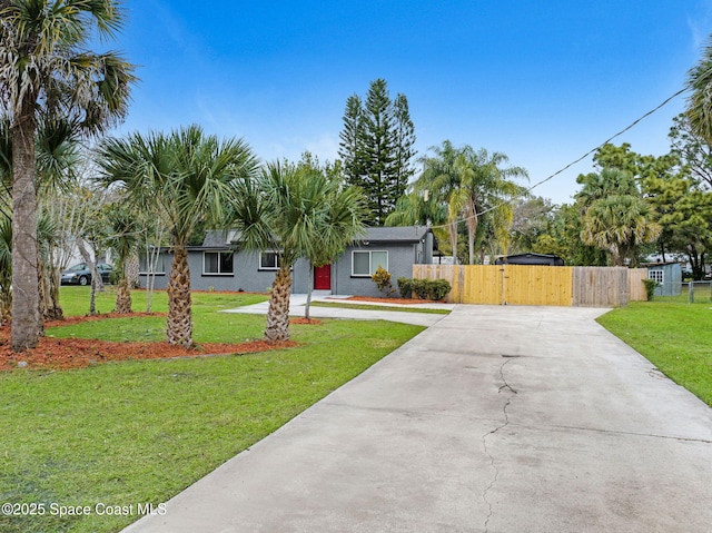 ranch-style house with a front yard