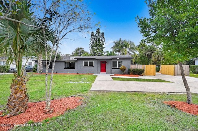 ranch-style house with a front lawn