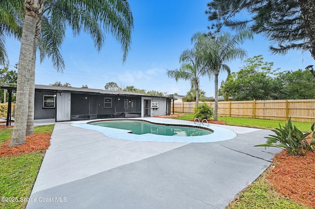 view of swimming pool featuring a patio