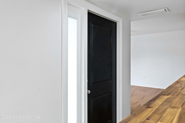 hall featuring hardwood / wood-style flooring