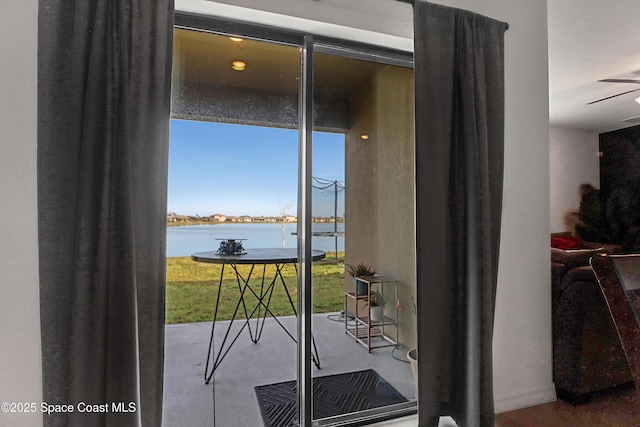 entryway with a water view