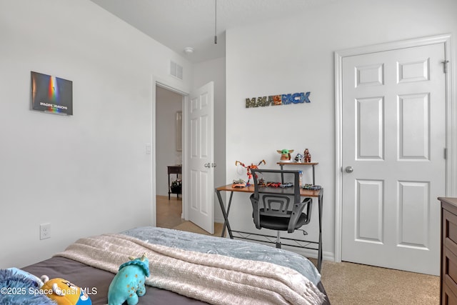 bedroom with light carpet