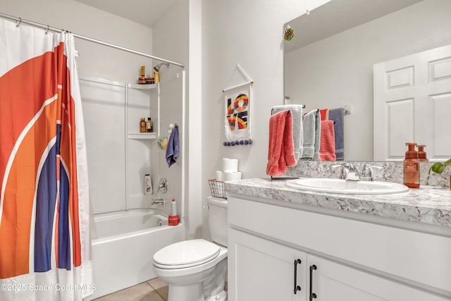 full bathroom featuring tile patterned floors, vanity, toilet, and shower / bath combo