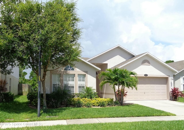 single story home with a garage and a front yard