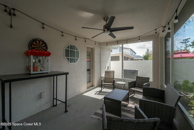 view of patio / terrace featuring an outdoor living space and ceiling fan