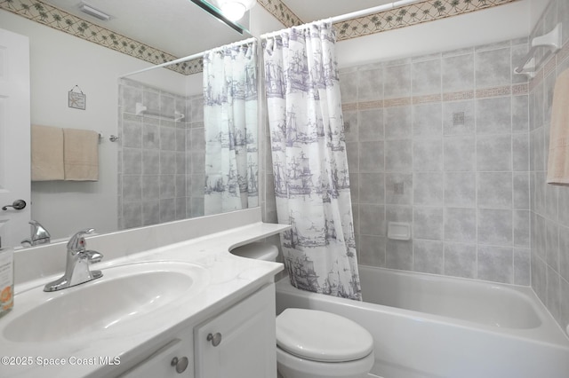 full bathroom with shower / bathtub combination with curtain, vanity, and toilet