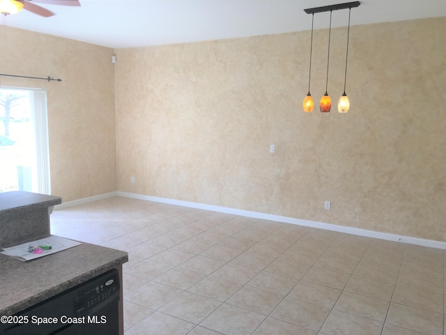 interior space featuring light tile patterned floors and ceiling fan