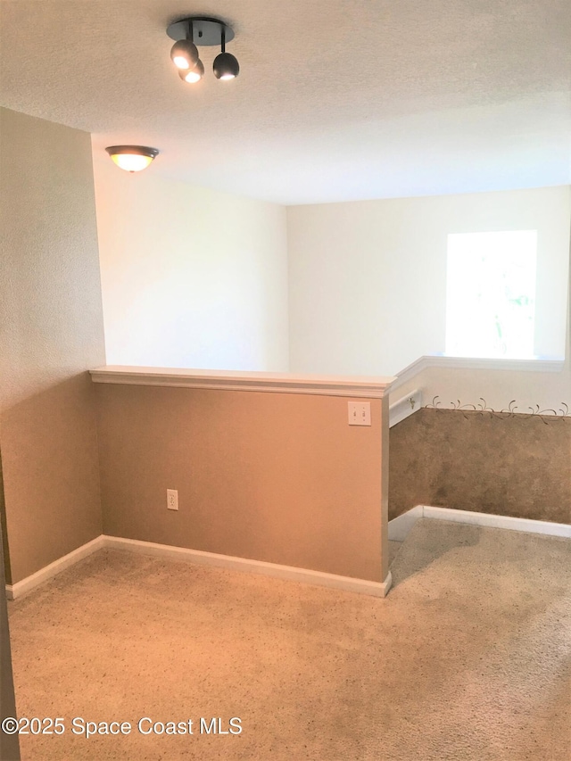 empty room with a textured ceiling