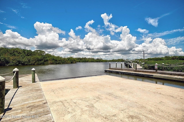 view of dock with a water view