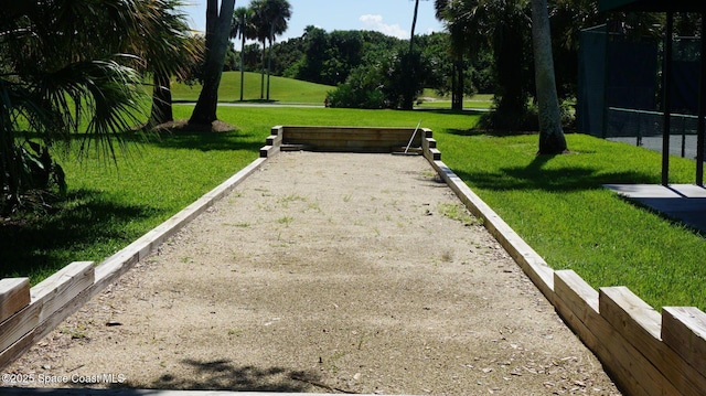 view of home's community featuring a lawn