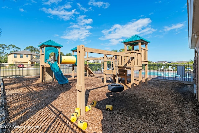 view of play area featuring a community pool