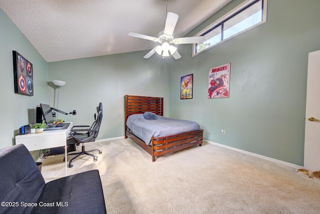 bedroom with ceiling fan, carpet floors, a textured ceiling, and vaulted ceiling