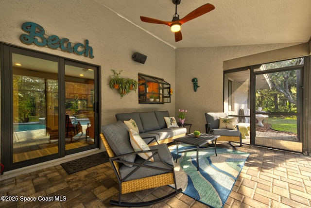 view of patio featuring an outdoor hangout area and ceiling fan