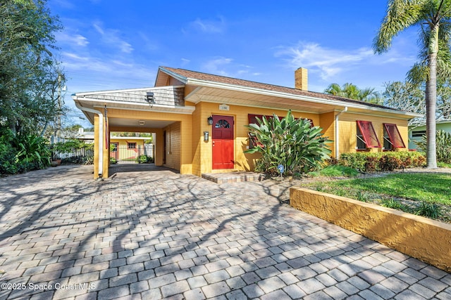 136 Valencia Rd, Rockledge, FL 32955 - single story home with a carport