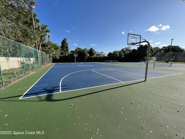 view of sport court with tennis court