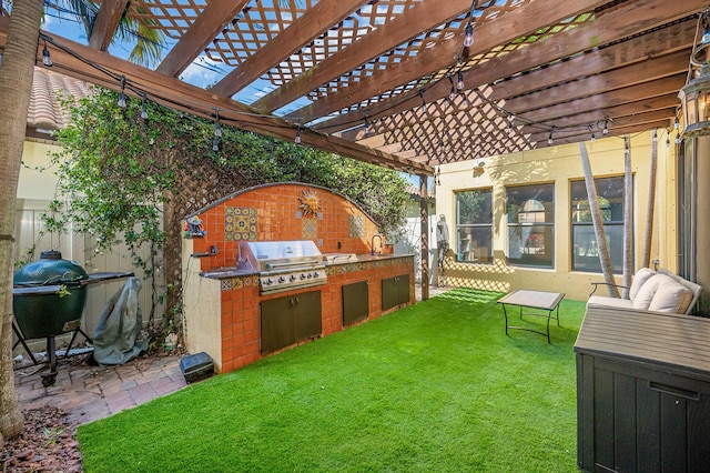 view of patio / terrace featuring an outdoor kitchen, grilling area, a pergola, and sink